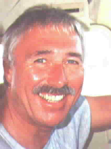 Photo of Bill in the cockpit of his Cessna.  Photo courtesy of John Noel.