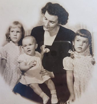 Photo of Greta, her Mom, and two sisters.