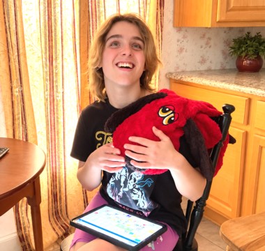 Grace with her ACC device. Photo courtesy of the author.