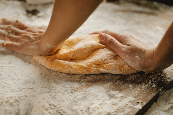 Photo by Klaus Nielsen: https://www.pexels.com/photo/chef-making-fresh-pastry-on-table-in-bakery-6287298/