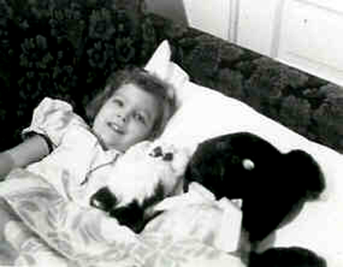 Photo of Kathleen, kitty, and Bearby when she was three.