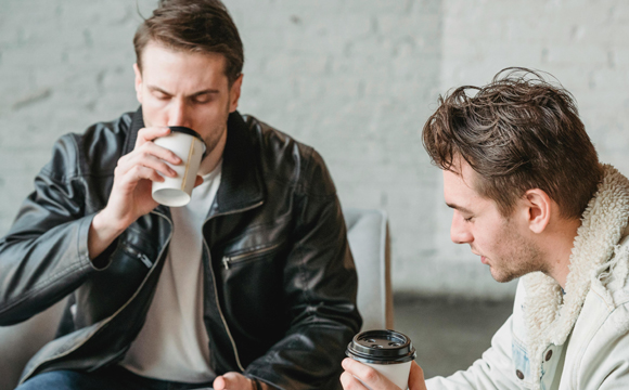 Photo by Laura Tancredi: https://www.pexels.com/photo/friends-sitting-together-and-drinking-coffee-7083897/